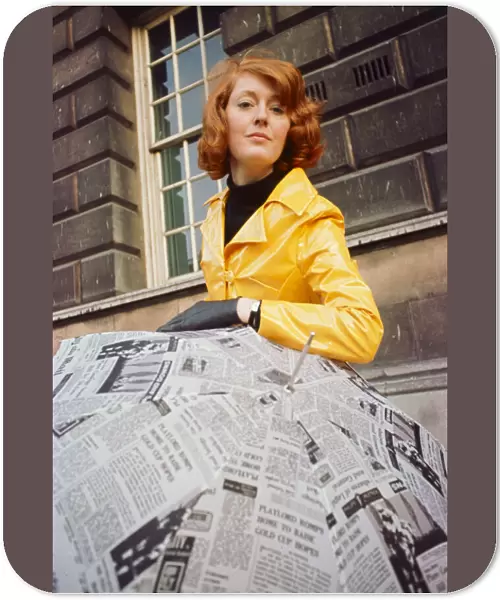 Beautician Kay Orr seen here modelling a bright yellow raincoat