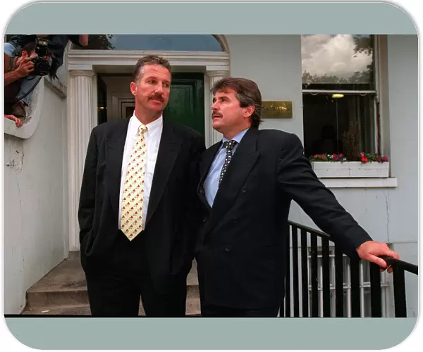 A dejected Ian Botham and Allan Lamb after losing their libel case against Imran Khan