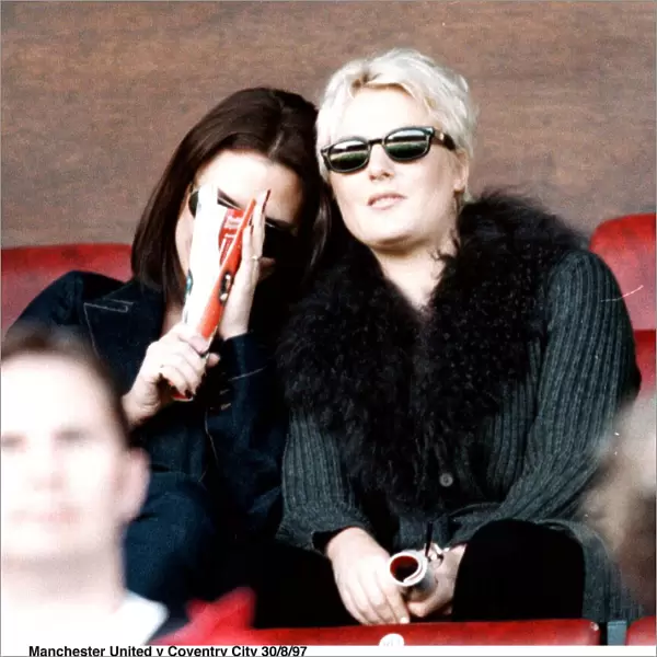 Victoria Adams posh spice of pop group the Spice Girls watching Manchester United v