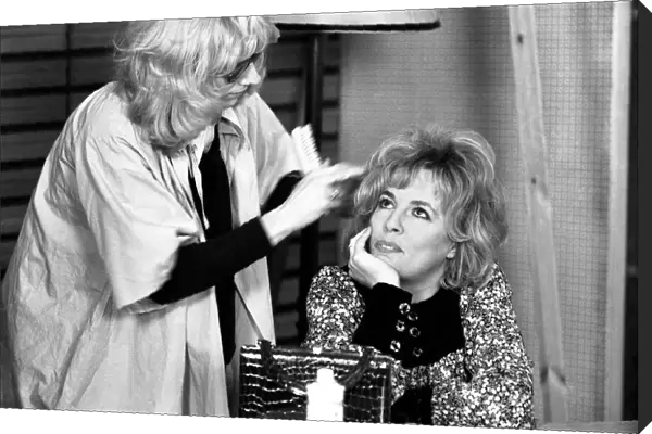 Thats life. Returns to B. B. C. 1. Esther Rantzen is prepared by a make-up girl