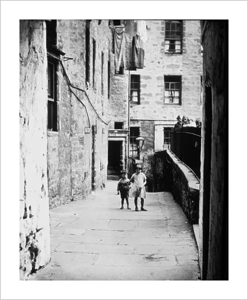 Children playing in the street close to Holy Trinity Church, Coventry city centre