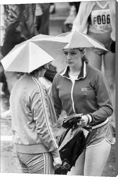 The Great North Run 27 June 1982 - Two runners keep dry before the race