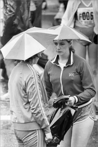 The Great North Run 27 June 1982 - Two runners keep dry before the race