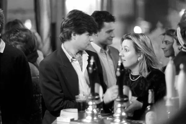 Drinkers in an East End Pub enjoying a pint of beer. March 1987