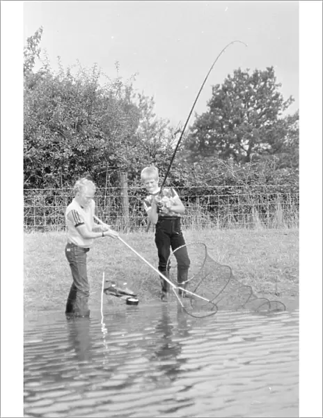 Youngsters Danny Woodhouse and Ian Mannering seen here fishing