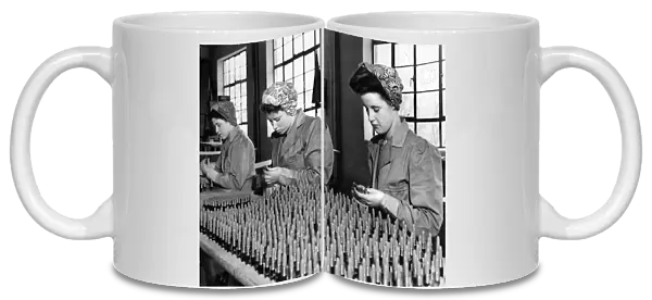 Women - Industry 1940 s. Girls at a Lanchester County Durham factory helping to pack