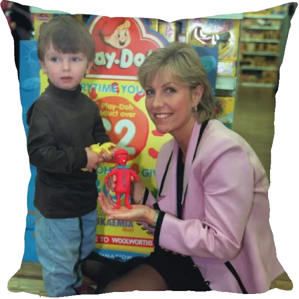 Tv Presenter Jill Dando and Oliver play with some Play Doh in Woolworths A©