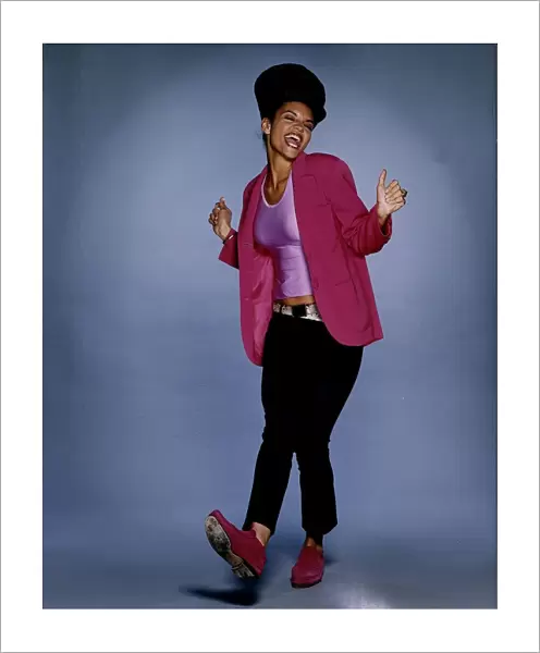 Pop singer and former model Efua posing in the studio. July 1993