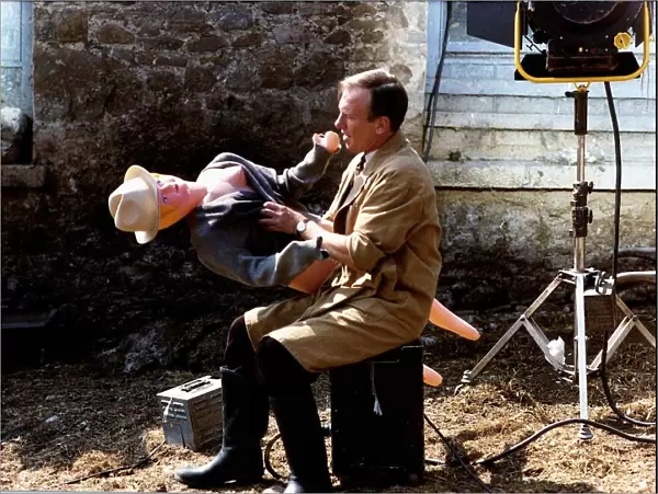 Christopher Timothy actor together with a blow-up doll on the set of the TV programme All