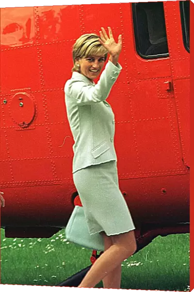 Diana, Princess of Wales preparres to board the helicopter Queen