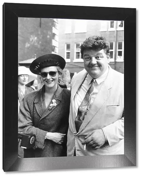 Robbie Coltrane actor arriving with unknown lady for the wedding of Nigel Planer