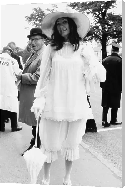 Janette Fraser in knickerbocker suit at Royal Ascot in June 1971 with parasol