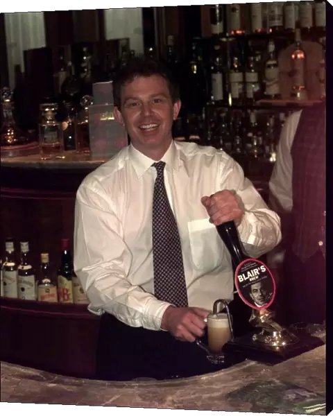 Tony Blair Labour Party leader in a pub pouring a half pint of beer that has been named