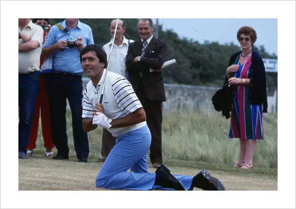 Seve Ballesteros golfer 1983 On knees after golf shot crowd watching
