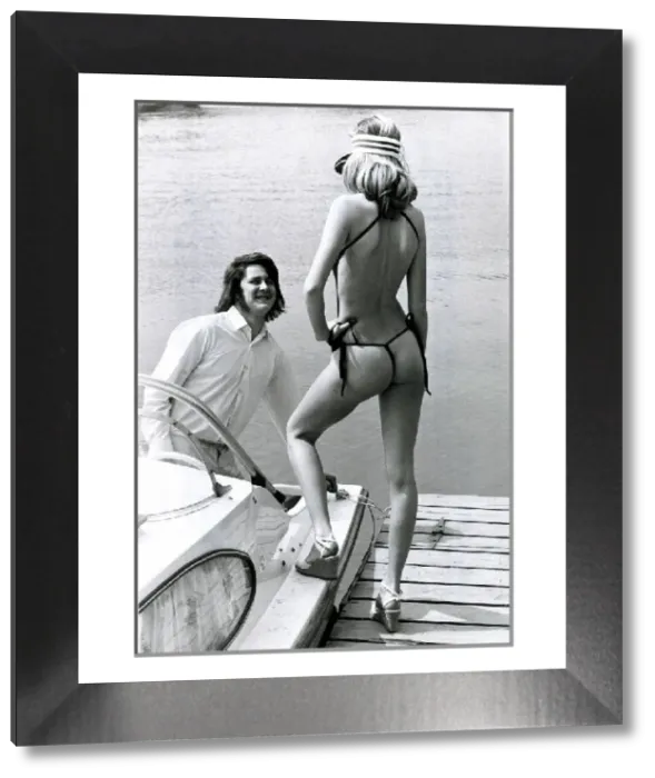 Framed Print : Vintage Print of Man and Model on Boat, May 1976 Framed Print : Vintage Print of Man and Model on Boat, May 1976