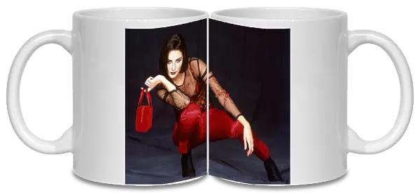 Red satin trousers and velvet bag (Warehouse) top (Oasis), December 1997