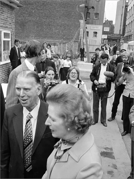 Margaret Thatcher visits Toynbee Hall in the East End singing with a nun July