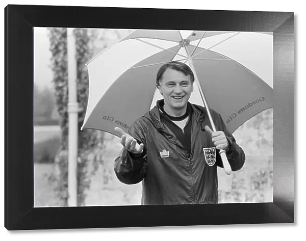 England manager Bobby Robson underneath an umbrella during an England training session at