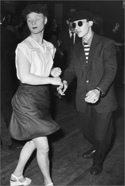 A young couple dancing at Club Be-Bop in High Cross, Tottenham, North london