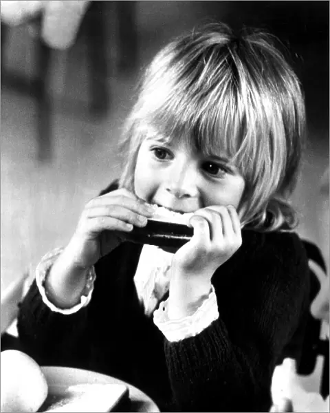 Young girl eating her lunch at school. 30th September 1971