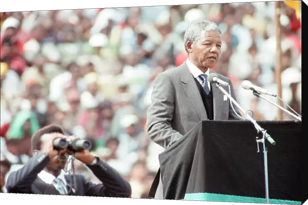 African National Congress (ANC) member Nelson Mandela adresses a rally attended by over