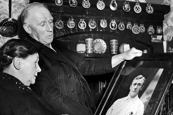 Former West Bromwich Albion and England footballer Jesse Pennington looking at a picture