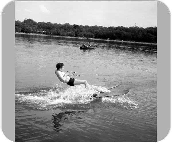 Jockey Lester Piggott enjoys some time off with a session of waterskiing, June 1954