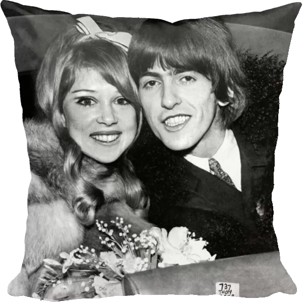 George Harrison of the Beatles pop group and his bride Patti Boyd, a former top model