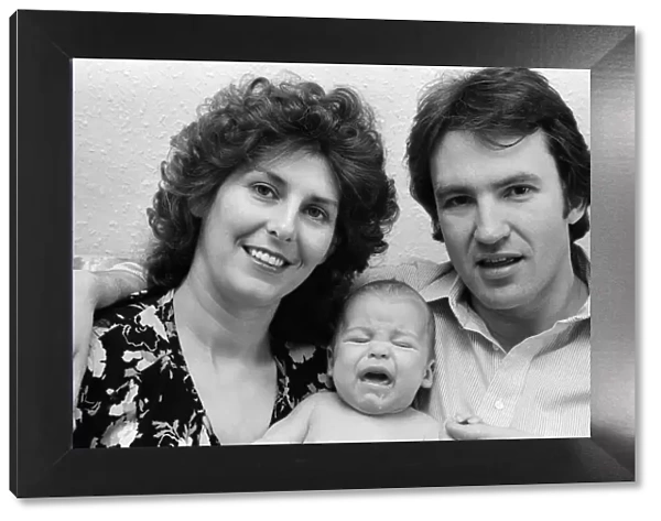 Actor Larry Lamb with his wife Linda and three month old son George. 15th March 1980