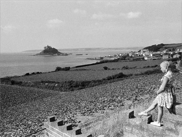 A girl looking out to St Michaels Mount, Cornwall, September 1968