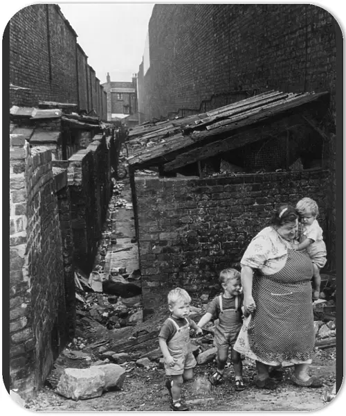 Liverpool Slums, 27th June 1962. Our Picture Shows... mother