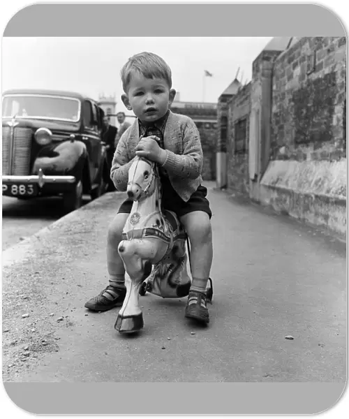 Two year old Peter Greenhill of the Falcon, off Fleet Street
