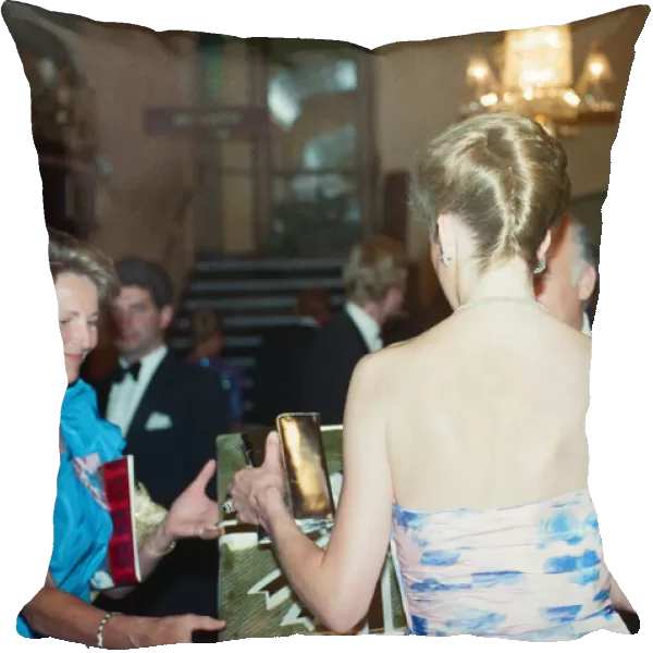 Back to camera, HRH Princess Diana, Princess of Wales attends the Premiere of Farewell to