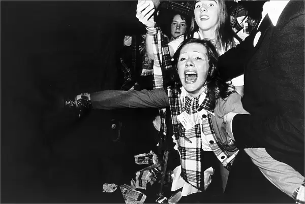 Fans of the pop group Bay City Rollers screaming Circa 1975