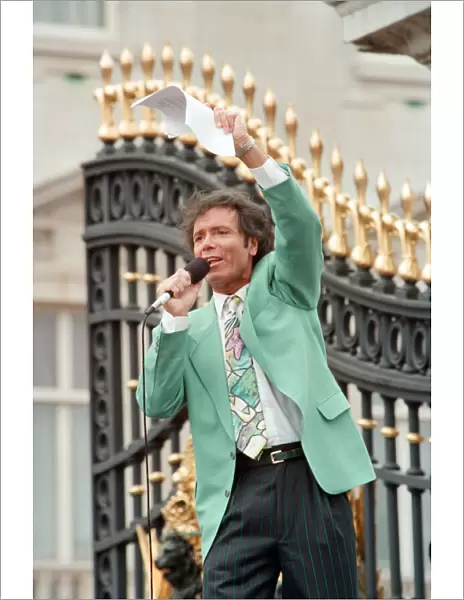 Cliff Richard singing for the crowds gathered at Buckingham Palace for World War II VE