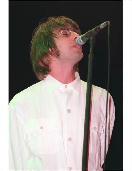 11 - LIAM GALLAGHER - SINGER WITH POP BAND OASIS PERFORMING AT