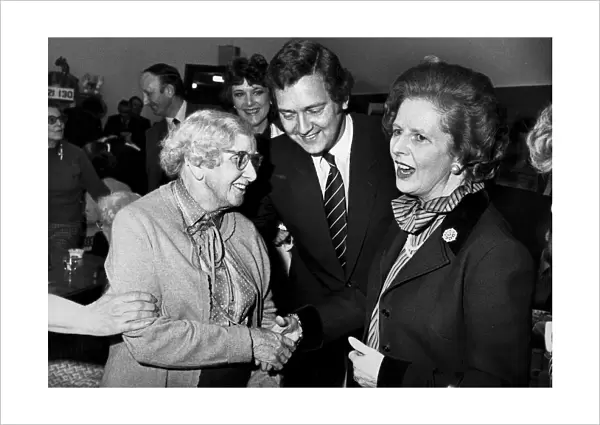 Margaret Thatcher with Jeremy Handley during visit to pensioners day centre - April 1983