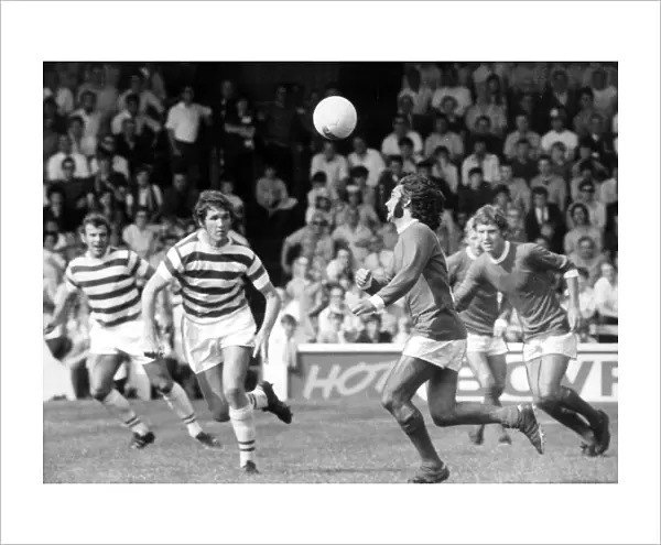 Reading v. Manchester United. Danger for Reading as George Best heads on a pass
