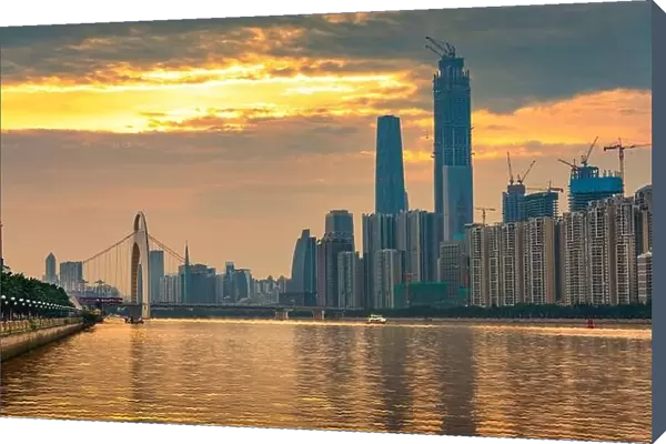Guangzhou, China skyline on the Pearl River at sunset