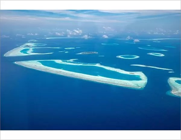 Beauty tropical island. Aerial view on tropical islands, drone, plane view from coral reef atoll in Maldives islands. Exotic travel nature destination
