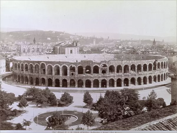 The Arena of Verona and the gardens in front.In the background, panorama of the city