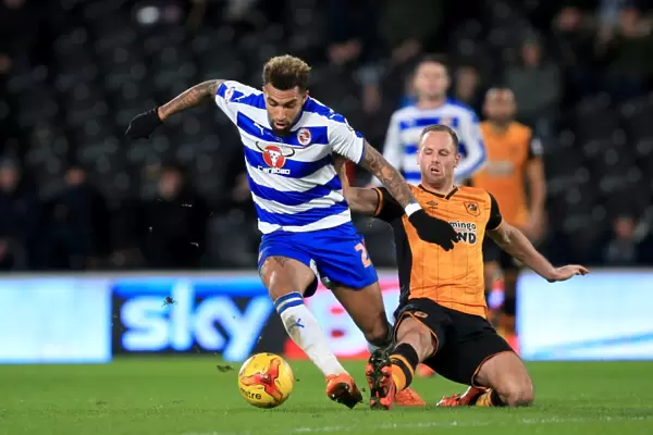 Battle for the Ball: Williams vs. Meyler in the Intense Championship Clash between Hull City and Reading