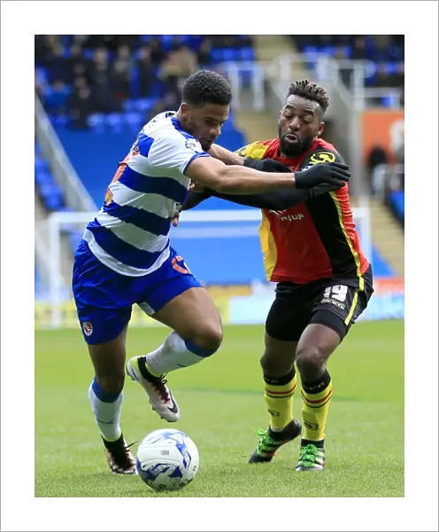 Battle for the Ball: McCleary vs. Maghoma in the Intense Sky Bet Championship Clash at Reading's Madejski Stadium