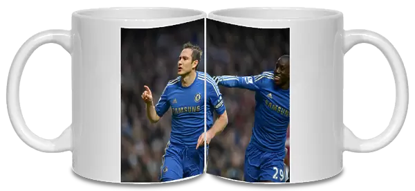 Chelsea's Frank Lampard and Demba Ba: Celebrating the Opening Goal against West Ham United in the Barclays Premier League