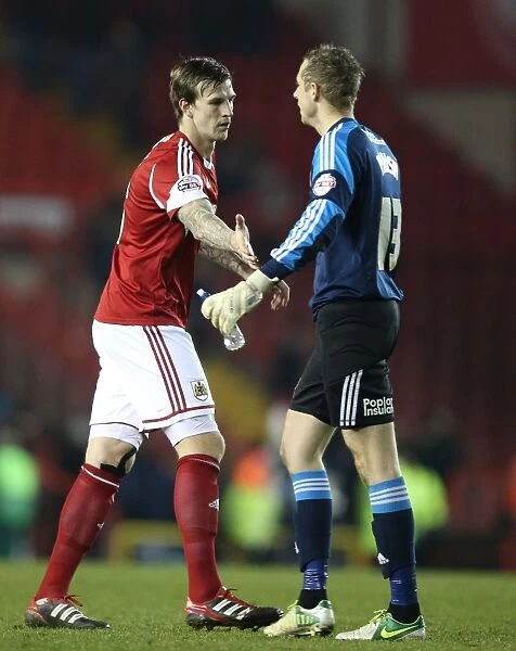 Aden Flint and Elliott Parish of Bristol City Share a Moment after Leyton Orient Match, November 2013