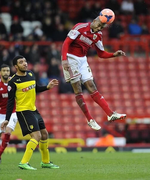 Battling for the Ball: Marvin Elliott vs. Watford in FA Cup Third Round at Ashton Gate
