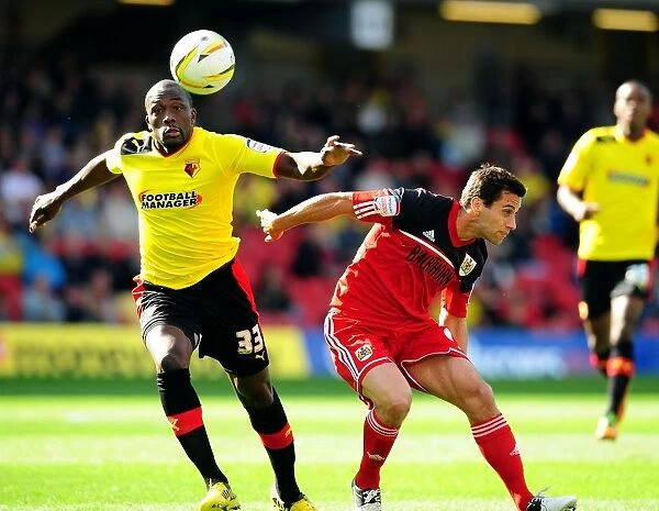 Battling for Supremacy: Nyron Nosworthy vs. Sam Baldock in the Championship Clash between Watford and Bristol City