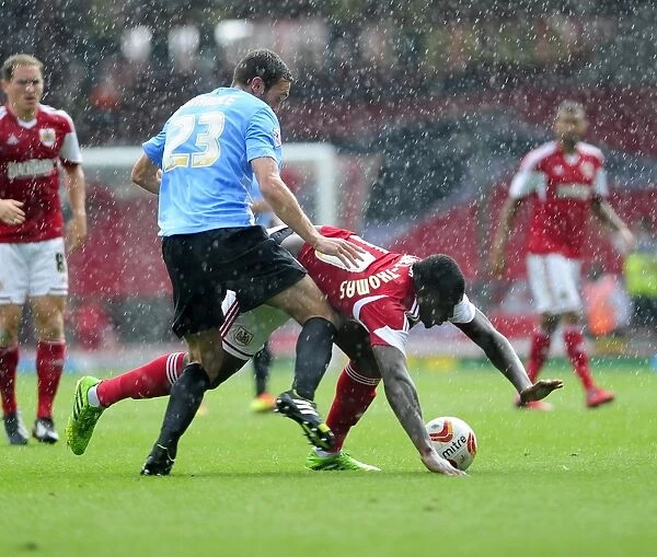 Bristol City's Jay Emmanuel-Thomas Fouled by Rory McArdle during Bradford City Match