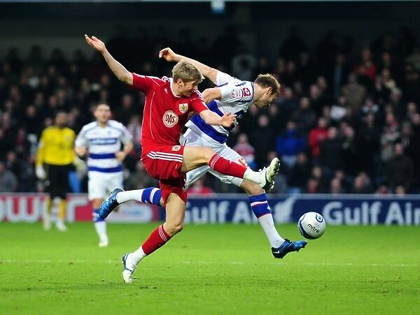 Bristol City's Jon Stead Fouled by QPR's Kaspars Gorkss in Championship Match