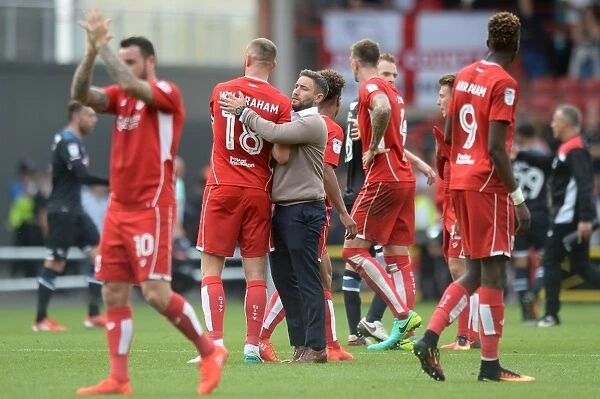 Bristol City's Lee Johnson Celebrates with Aaron Wilbraham After Derby County Win
